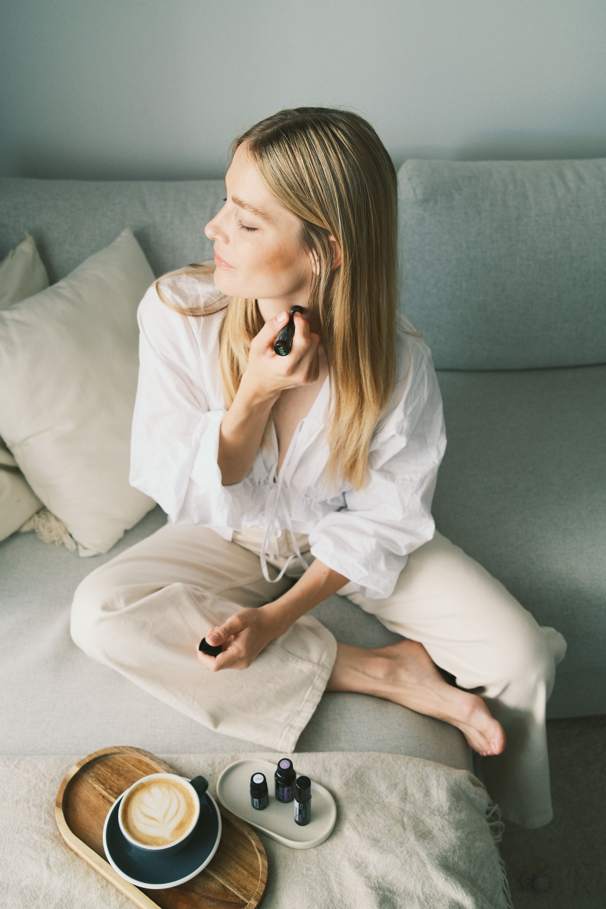 Gyöngyi applying an essential oil roller