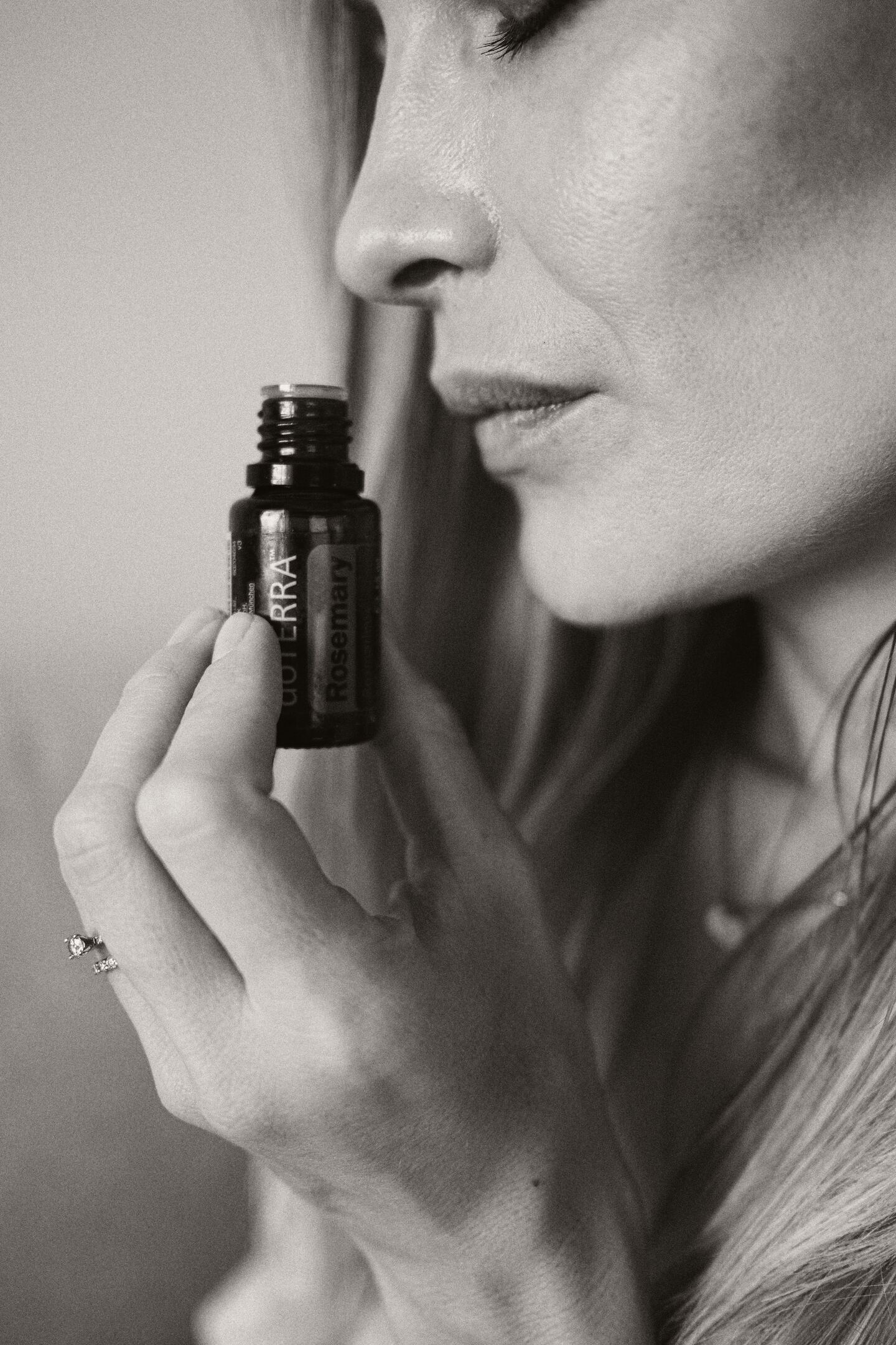 Breathing in dōTERRA Rosemary oil, black and white